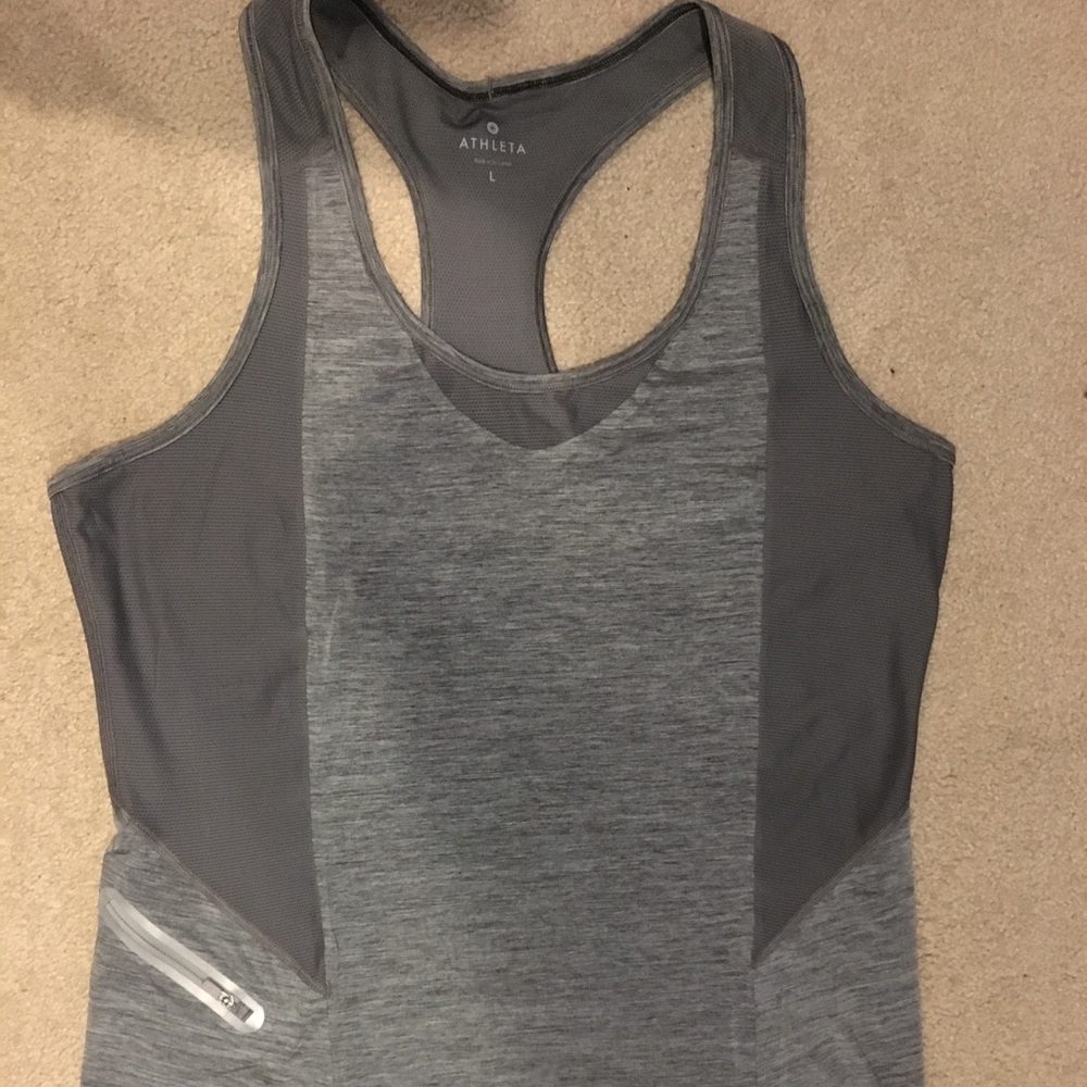 EUC Athleta tank with front zip pocket. Forerunner